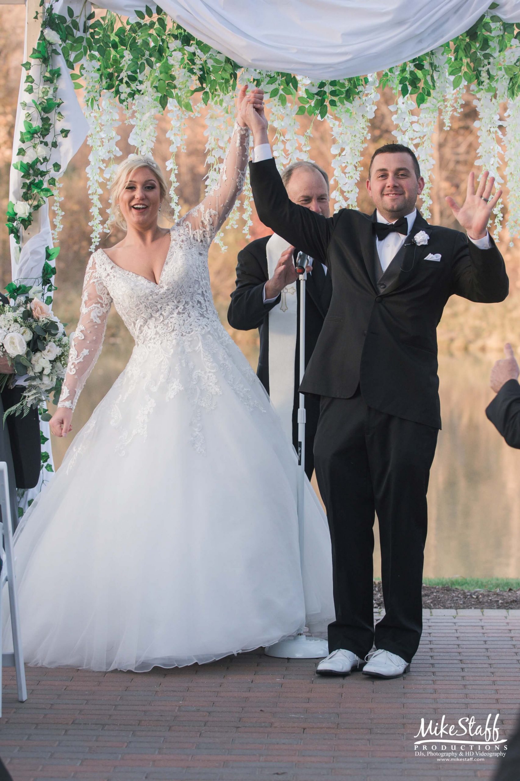 bride and groom recessional celebration