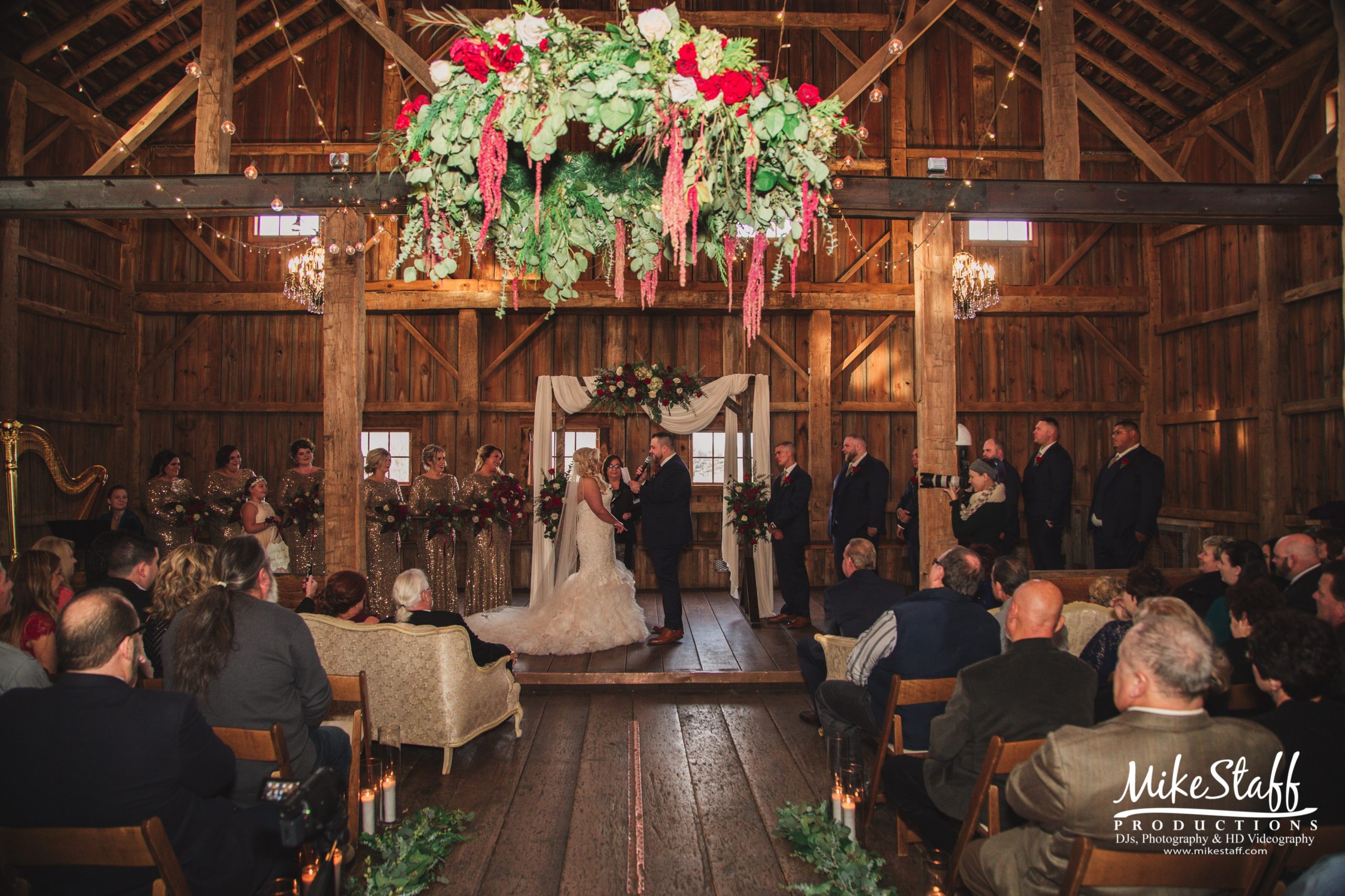 bride and groom at barn wedding ceremony