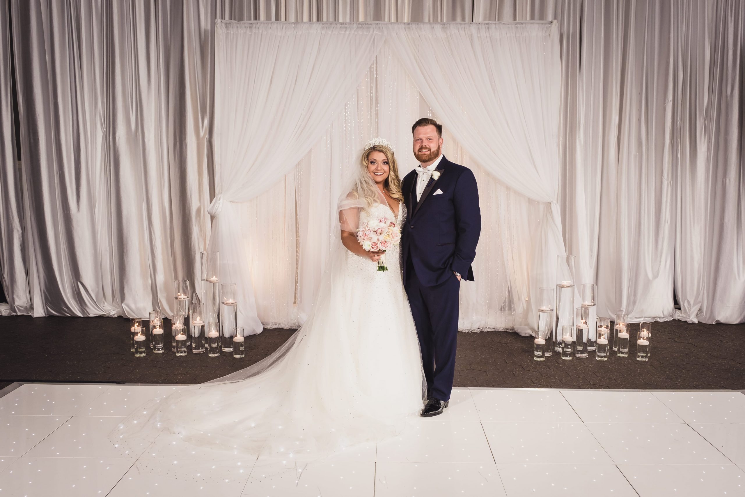 bride and groom portrait in waterview loft at port detroit