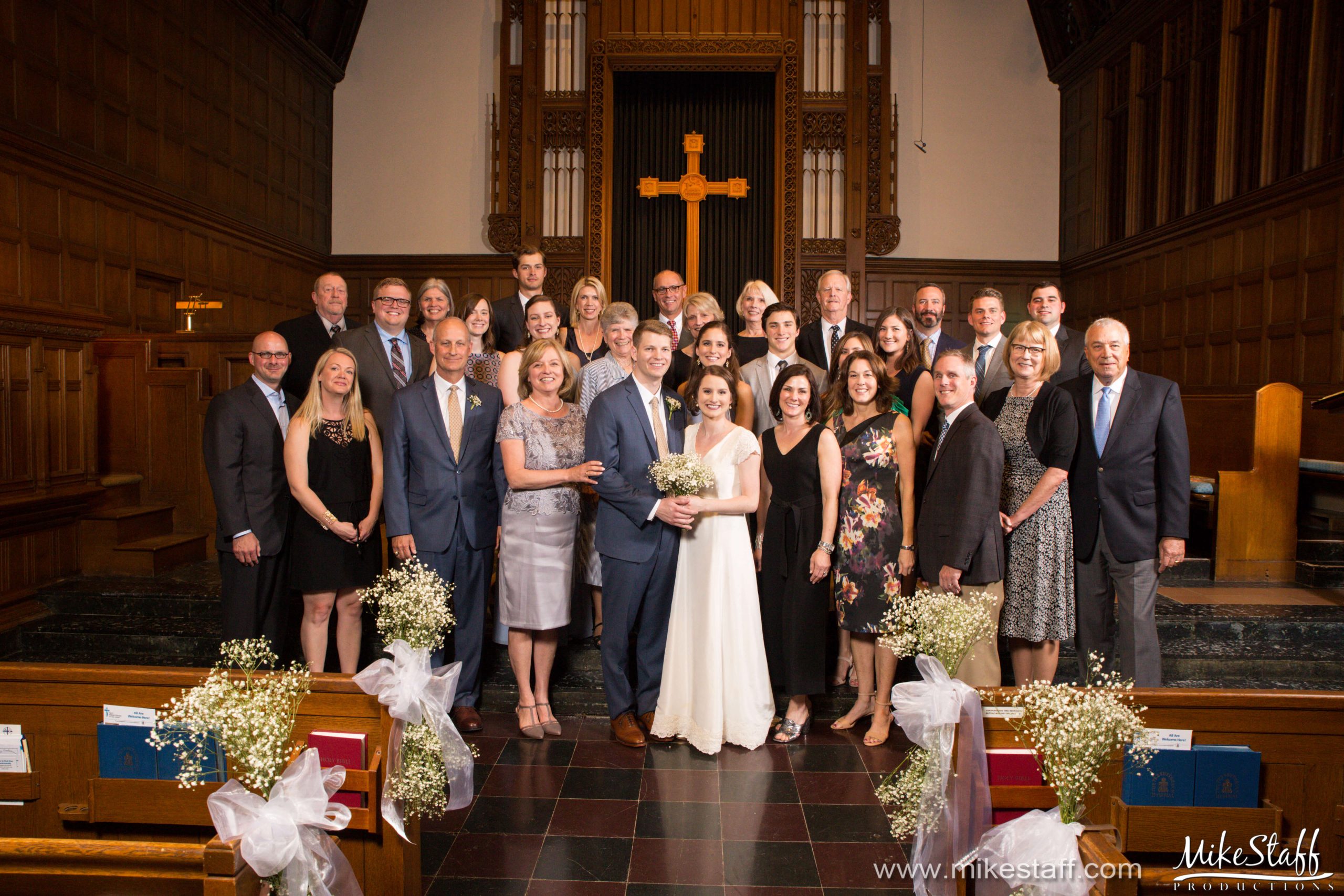 family formal wedding photos at church