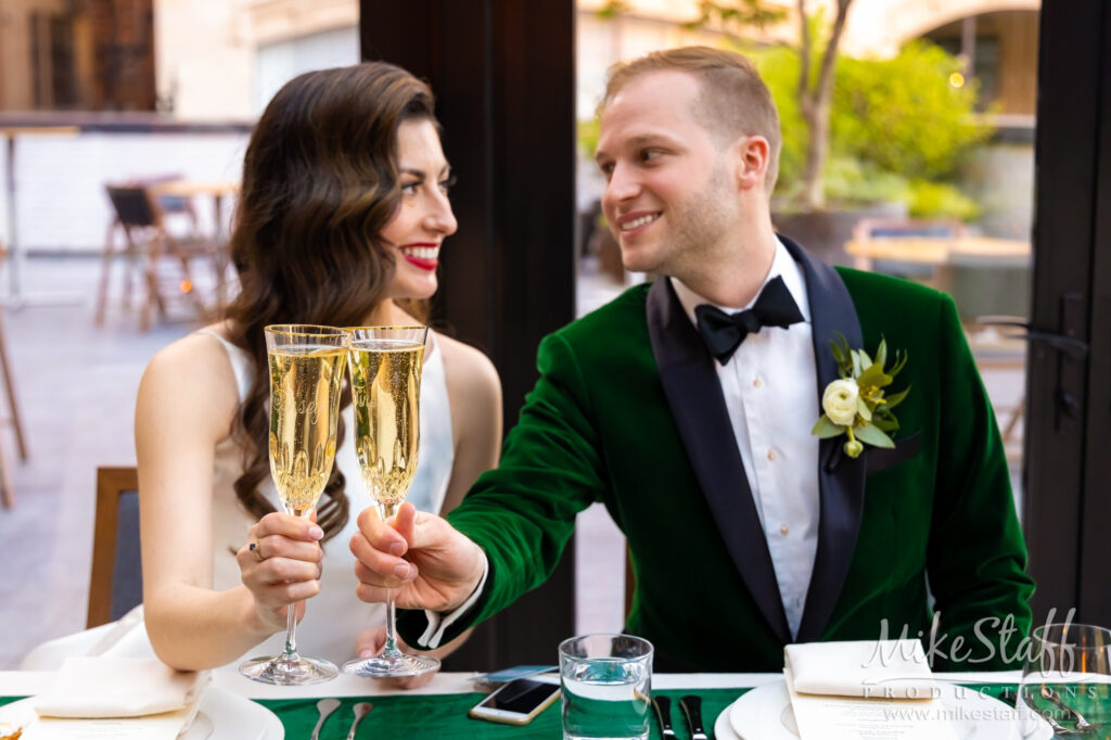 Kylie and Tyle toasting champagne Shinola Hotel weddings