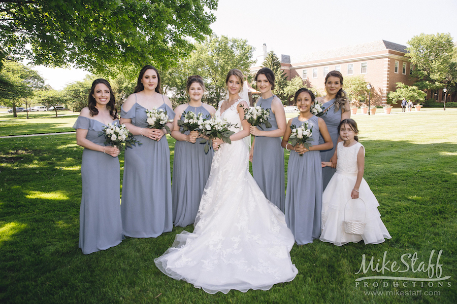 bride and bridesmaids outside dearborn inn