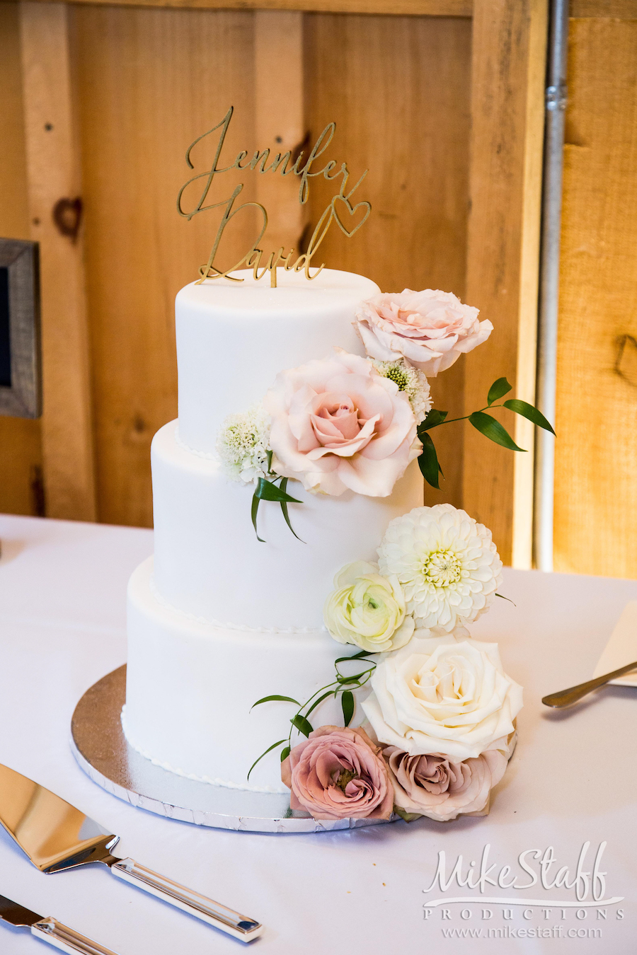 Wedding Cake with blush and white flowers