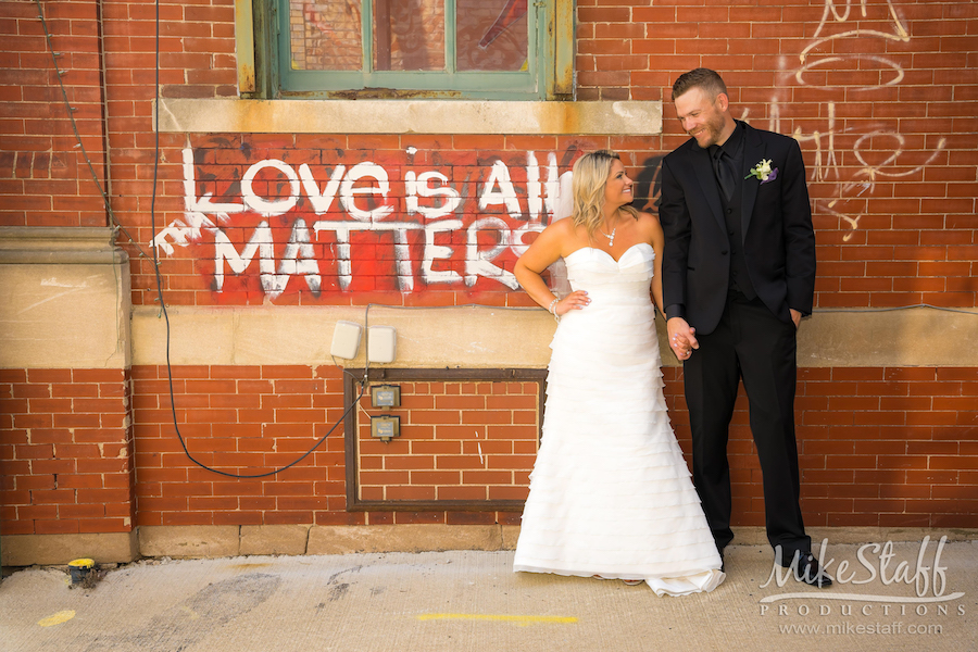 bride and groom with graffiti in pontiac