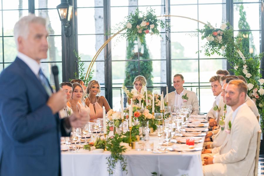 dad giving speech wedding reception