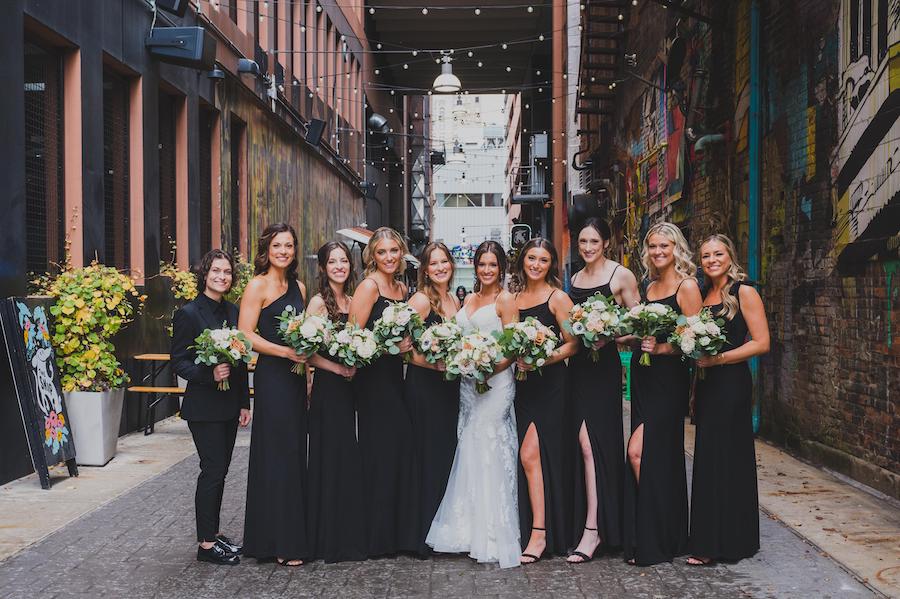 bridemaids in black dresses in parker's alley