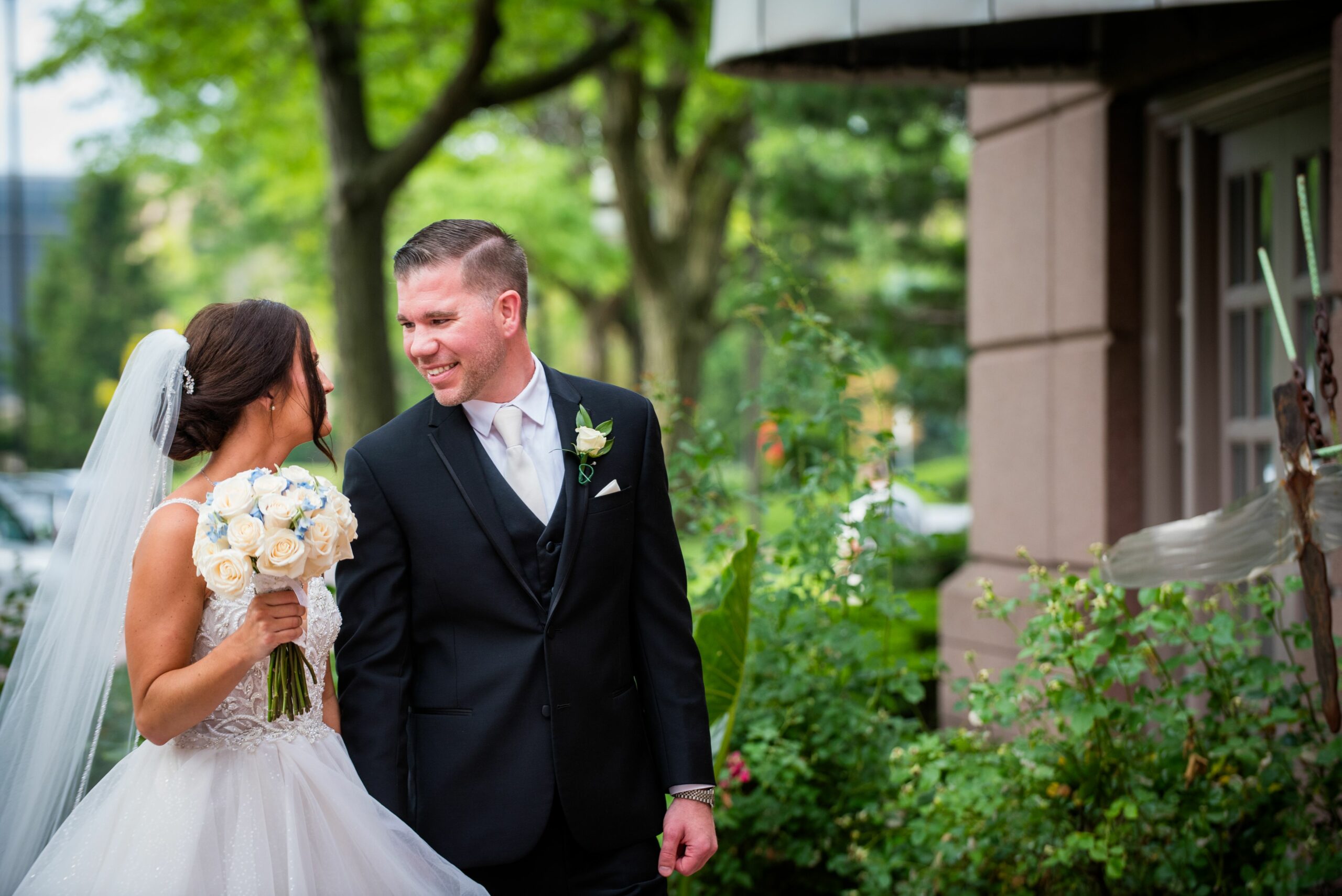 Mike Staff Productions Detroit Wedding Photography_bride and groom walking on venue grounds The Henry Hotel Wedding of Julie & Ryan