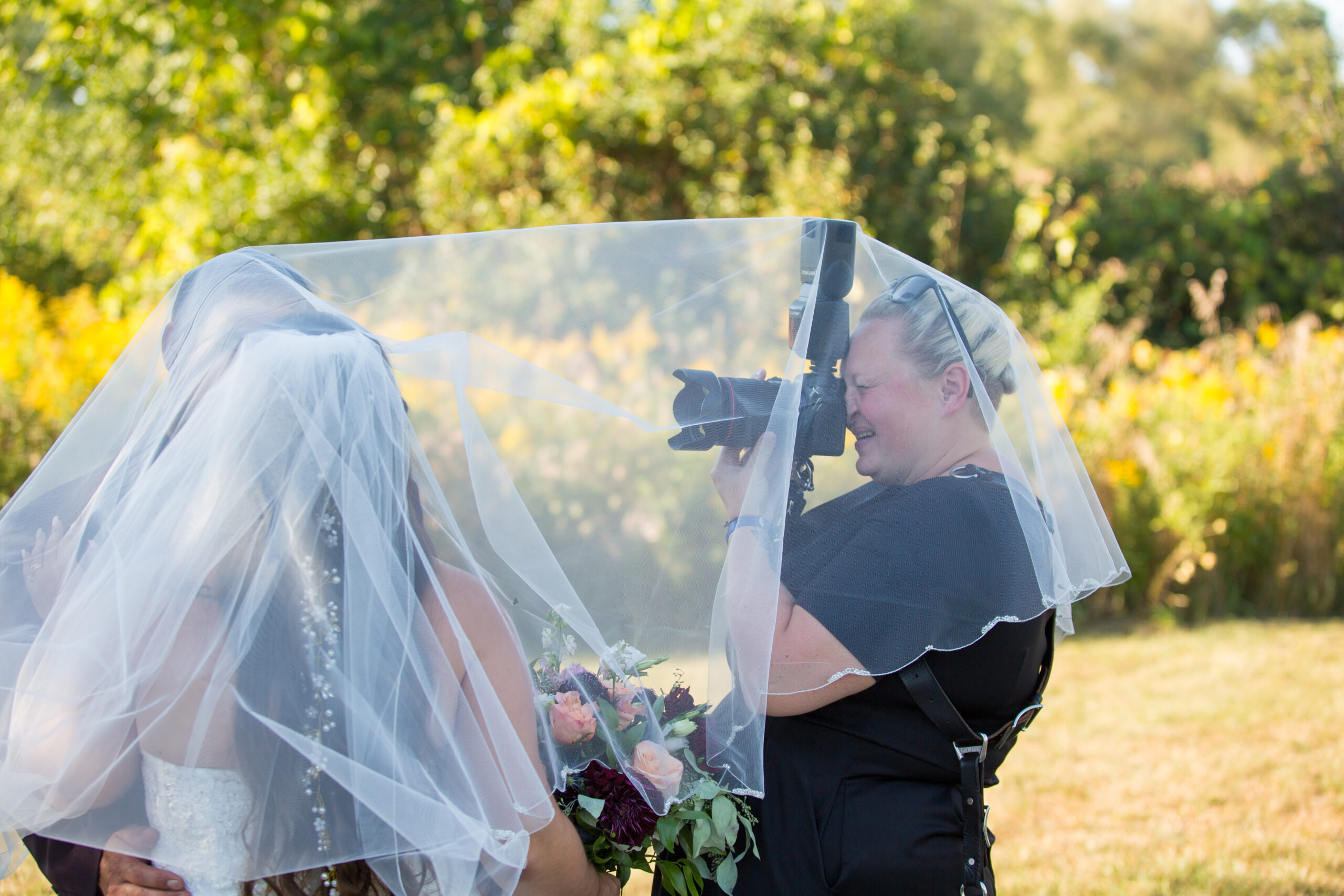 professional wedding photographer_Mike Staff Productions_photographer under veil