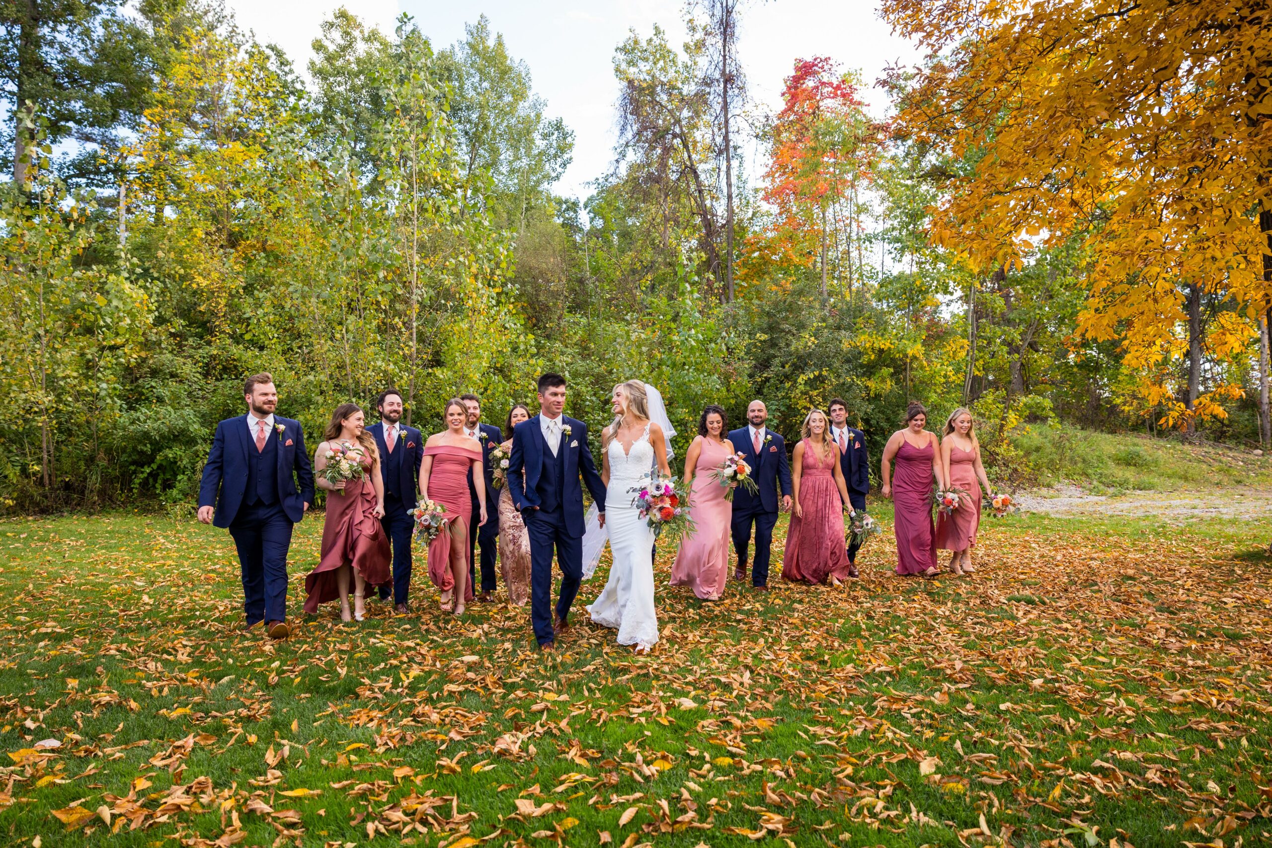 Detroit Wedding Photography_Waldenwoods_bridal party walking through leaves